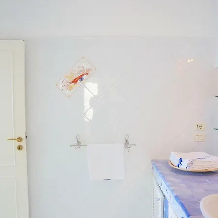 Casa Acquamarina 아파트 빌라노바 디 오스투니